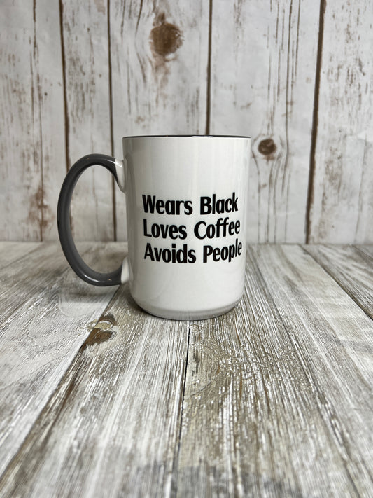 Wears Black, Loves Coffee, Avoids People